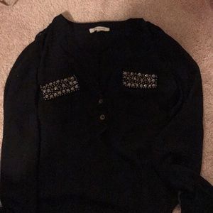 Black blouse with design pockets